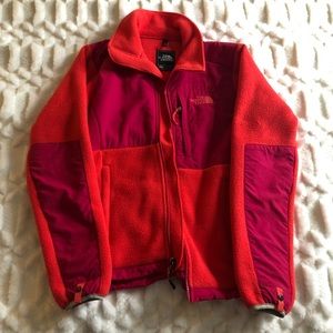 Pink and orange north face jacket
